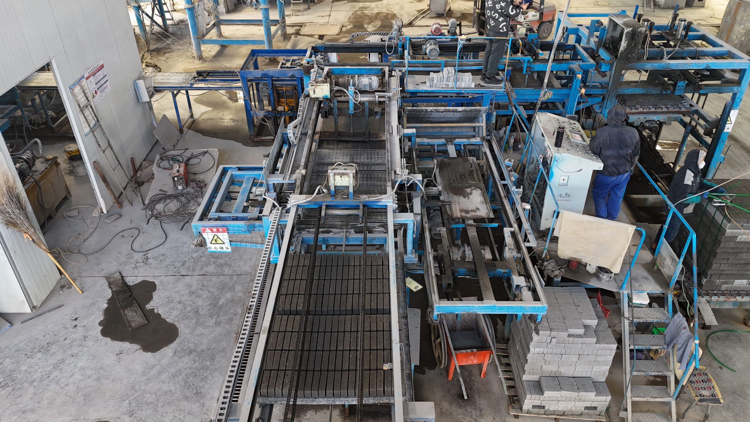 automatic brick stacking and wrapping machine concrete block stacking cubing packaging line